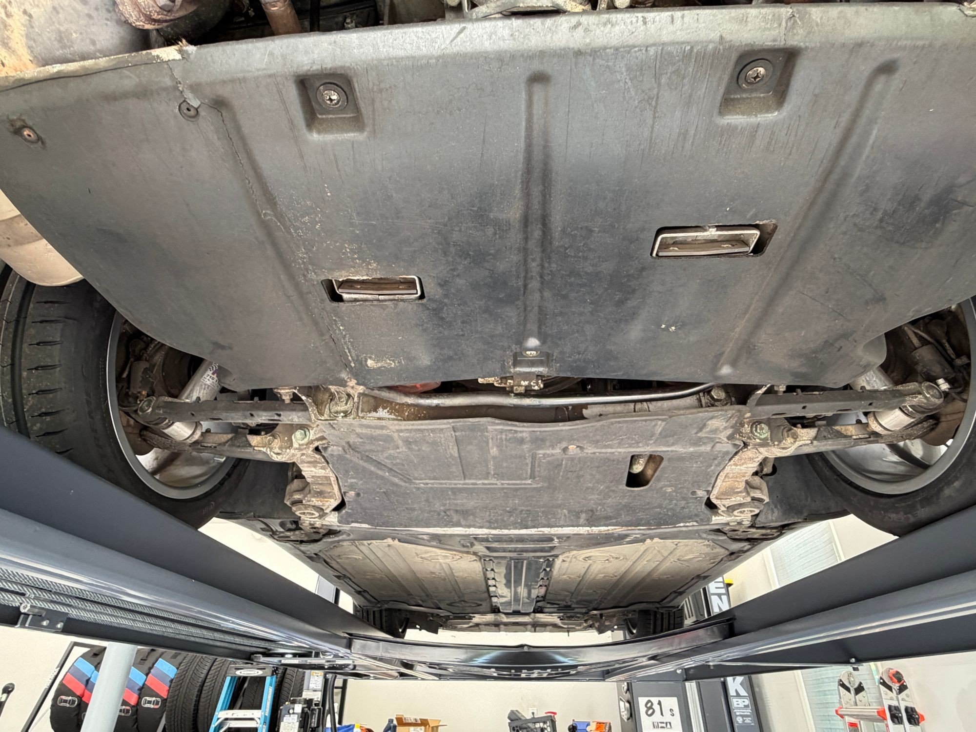 1997 Porsche 911 Carrera in Zenith Blue Metallic, undercarriage photo 1