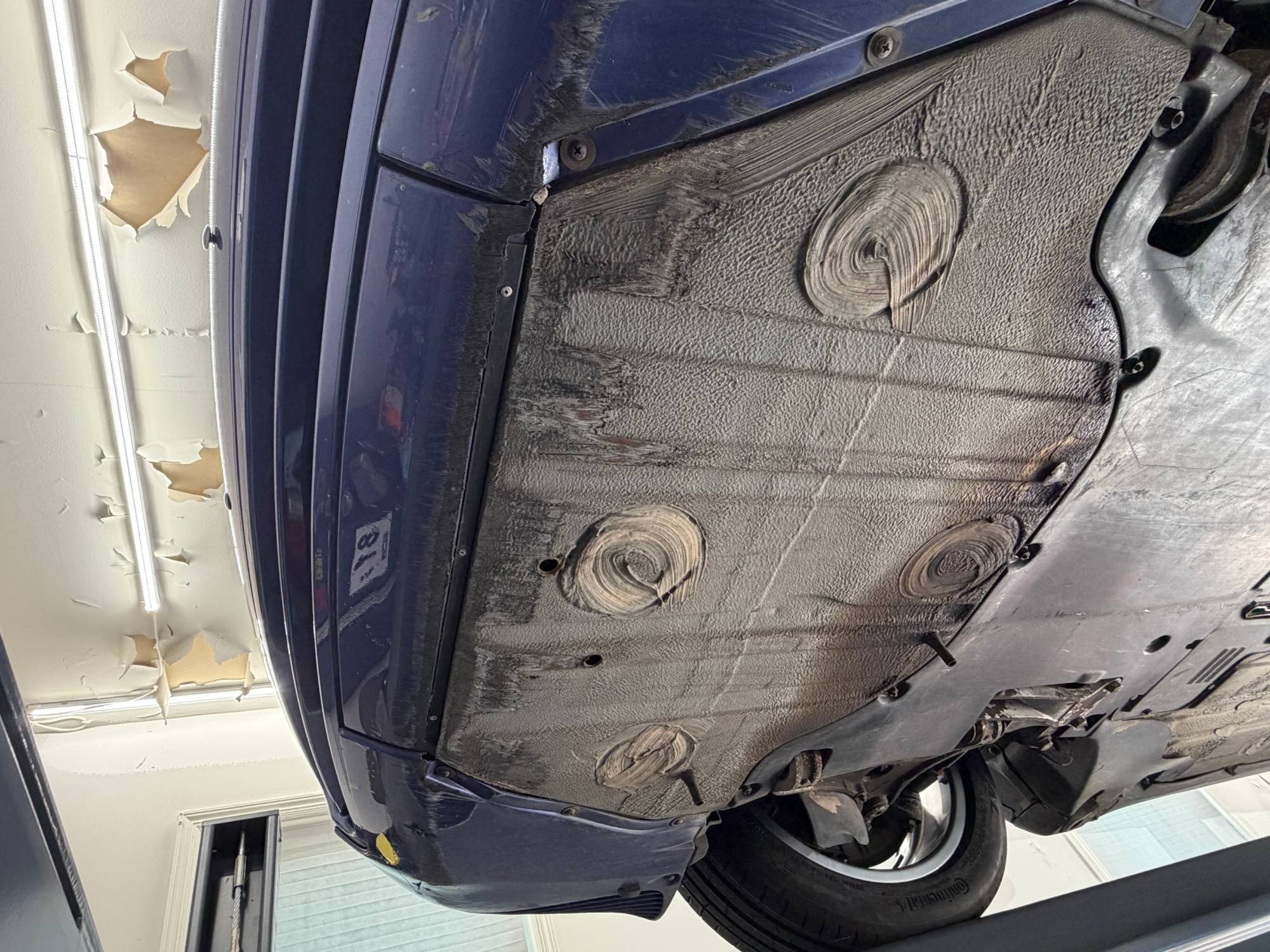 1997 Porsche 911 Carrera in Zenith Blue Metallic, undercarriage photo 5